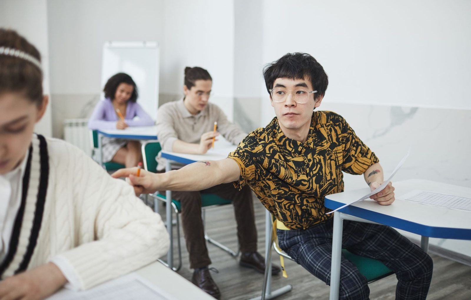 Student taking a timed practice test at a desk