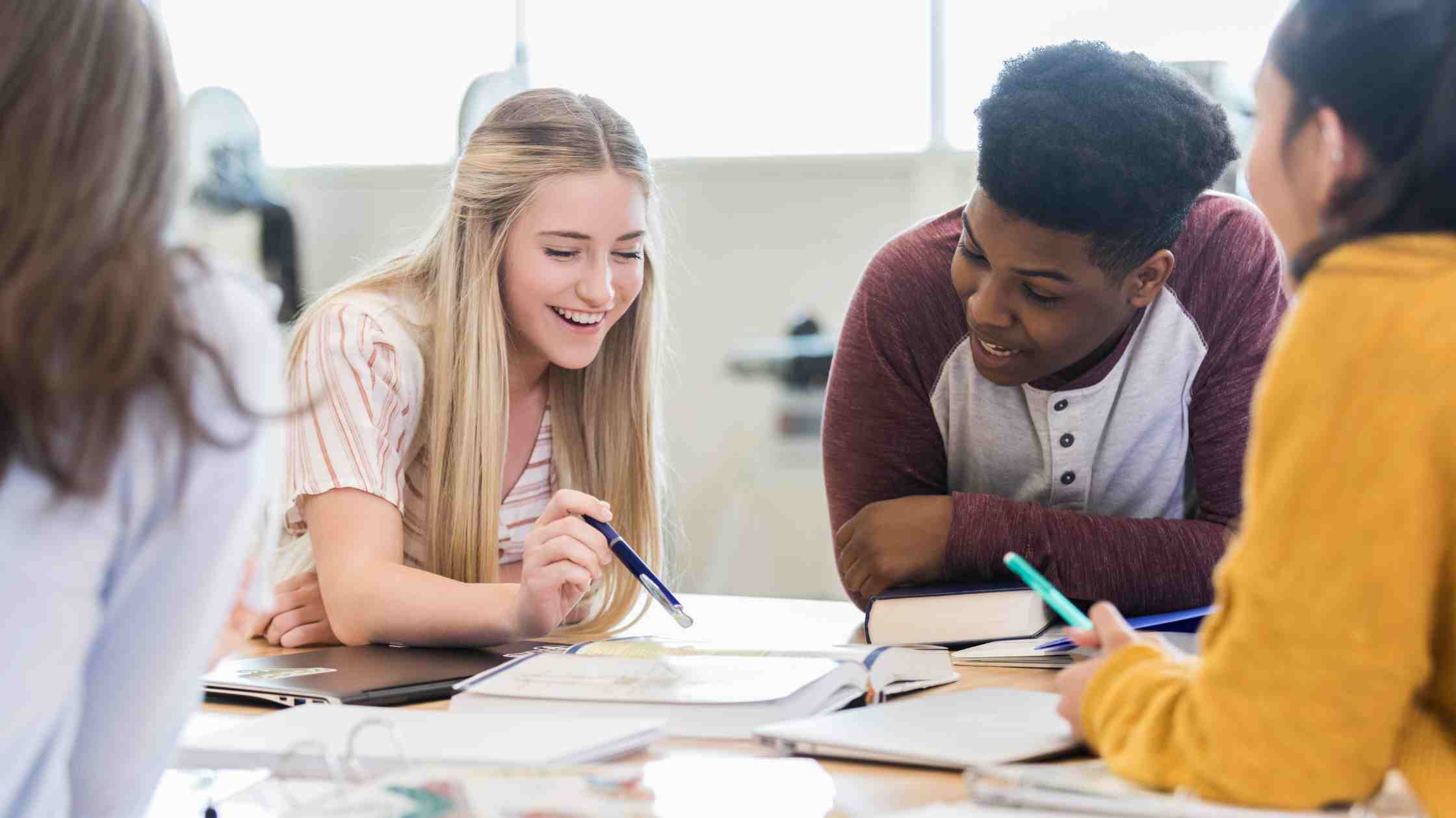 Students discussing college goals, reflecting early considerations of whether they should really apply to Duke University.