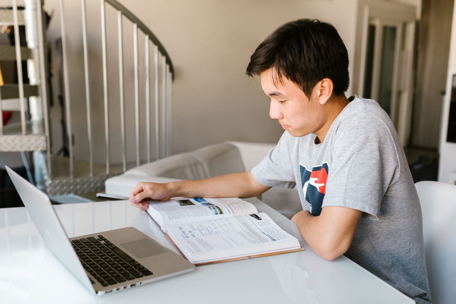 Student logged into laptop to send ACT scores online